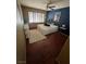 Bedroom featuring a bed, ceiling fan, window with blinds and decor at 3055 Key Largo Dr # 204, Las Vegas, NV 89120
