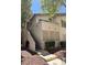 Charming condo exterior with private entry stairs and well-maintained landscaping at 3055 Key Largo Dr # 204, Las Vegas, NV 89120