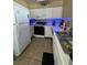 Bright kitchen with white cabinets, modern appliances, and stainless steel sink, perfect for cooking and entertaining at 3055 Key Largo Dr # 204, Las Vegas, NV 89120