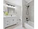 Updated bathroom with a white vanity, shower, and new fixtures at 321 Oil Lantern Ln, Las Vegas, NV 89145
