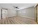 Inviting bedroom with sleek wood floors, ample light, and a neutral color palette at 321 Oil Lantern Ln, Las Vegas, NV 89145