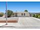 Charming single-story home with a well-maintained front yard and long driveway at 321 Oil Lantern Ln, Las Vegas, NV 89145