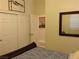 Bedroom featuring a closet, mirror, and view to next room at 35 Emerald Dunes Cir, Henderson, NV 89052