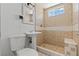 Bathroom showcasing pedestal sink and tiled walk-in shower with bench at 3684 Hawaii Ave, Las Vegas, NV 89104