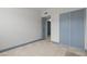 Bedroom with tile flooring, a closet, and doorway at 3684 Hawaii Ave, Las Vegas, NV 89104