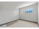 Bedroom features tile flooring and natural light from the window at 3684 Hawaii Ave, Las Vegas, NV 89104