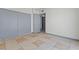 Bedroom features tile flooring and a sizable closet with sliding doors at 3684 Hawaii Ave, Las Vegas, NV 89104