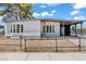 Charming single-story home with stucco siding, covered porch, and bay windows offers curb appeal at 3684 Hawaii Ave, Las Vegas, NV 89104