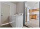 Convenient laundry room with full-size washer and dryer just off the kitchen offers practicality at 3684 Hawaii Ave, Las Vegas, NV 89104