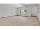 Bright living room with tile floors, gray trim and a large bay window to let in the light at 3684 Hawaii Ave, Las Vegas, NV 89104