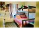 Charming bedroom with bunk beds, playful decor, and soft pink accents at 3763 Sonrisa Vista Ave, Henderson, NV 89044