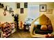 Whimsical room featuring a play tent, creative storage, and playful decor at 3763 Sonrisa Vista Ave, Henderson, NV 89044