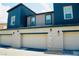 Attached garages provide convenient parking and storage for residents of this multi-Gathering dwelling at 3763 Sonrisa Vista Ave, Henderson, NV 89044