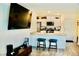 Open-concept living area with modern furnishings and eat-in kitchen at 3763 Sonrisa Vista Ave, Henderson, NV 89044