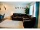 Spacious and bright living area, featuring a comfortable sofa, a dining set, and stylish decor at 3763 Sonrisa Vista Ave, Henderson, NV 89044