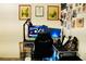 Modern home office with a gaming setup, gallery wall, and ergonomic chair at 3763 Sonrisa Vista Ave, Henderson, NV 89044
