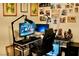 Modern home office with a gaming setup, gallery wall, and ergonomic chair at 3763 Sonrisa Vista Ave, Henderson, NV 89044