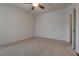Carpeted bedroom with a ceiling fan and two windows; perfect for relaxation or as a guest room at 3936 Pepper Thorn Ave # 3, North Las Vegas, NV 89081