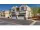 Exterior of building showcasing garages and multiple living units at 3936 Pepper Thorn Ave # 3, North Las Vegas, NV 89081