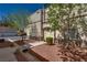 Charming townhouse with a welcoming entrance, lovely landscaping and shade trees, enhancing its curb appeal at 3936 Pepper Thorn Ave # 3, North Las Vegas, NV 89081