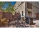 Cozy backyard patio area with brick wall and landscaping, perfect for relaxing and entertaining outdoors at 3936 Pepper Thorn Ave # 3, North Las Vegas, NV 89081