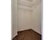 Walk-in closet featuring laminate floors and wire shelving for ample storage and organization at 3936 Pepper Thorn Ave # 3, North Las Vegas, NV 89081