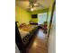 Comfortable bedroom offering a sleeping area with a ceiling fan and natural light at 4503 Springdale Ave, Las Vegas, NV 89121