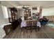 Inviting dining area with wood floors, table, and furniture with natural light from the window at 4503 Springdale Ave, Las Vegas, NV 89121