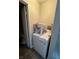Practical laundry area with a washing machine and adjacent bathroom at 4503 Springdale Ave, Las Vegas, NV 89121