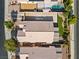 Aerial view showcasing the property's layout, including backyard with pool and patio; outlined in white at 5115 Morning Splash Ave, Las Vegas, NV 89131