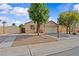 Charming single-story home with well-maintained landscaping, mature trees, and a spacious driveway at 5115 Morning Splash Ave, Las Vegas, NV 89131