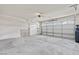 Spacious two-car garage with ample room for storage, clean floors, and bright lighting at 5115 Morning Splash Ave, Las Vegas, NV 89131