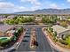 Community entrance with gates, landscaping, and common areas at 5115 Morning Splash Ave, Las Vegas, NV 89131