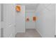 Bright walk-in closet featuring wire shelving and neutral flooring at 5115 Morning Splash Ave, Las Vegas, NV 89131