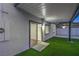 Inviting covered patio with artificial grass, perfect for outdoor living and relaxation at 5200 Blanton Dr, Las Vegas, NV 89122