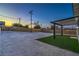Backyard featuring a gravel area, turf, and covered patio perfect for entertaining at 5200 Blanton Dr, Las Vegas, NV 89122