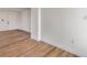 Hallway with new floors and fresh paint leads to other areas of the home at 5200 Blanton Dr, Las Vegas, NV 89122