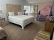 Bedroom featuring a queen bed with a headboard, plush carpet and play tent at 6208 Mandarin Dr, Las Vegas, NV 89108