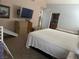 Large bedroom showing an entertainment center, bedroom set, and playhouse at 6208 Mandarin Dr, Las Vegas, NV 89108