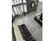 Living room with large windows, a sofa, and tile floor at 6208 Mandarin Dr, Las Vegas, NV 89108