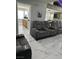 Comfortable living area featuring marble floors and luxury reclining seating at 6208 Mandarin Dr, Las Vegas, NV 89108