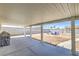 Outdoor patio space with chairs for outdoor gatherings and relaxed outdoor living at 6920 Singing Dunes Ln, Las Vegas, NV 89145