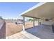 Backyard featuring a patio, seating area, and a spacious yard at 6920 Singing Dunes Ln, Las Vegas, NV 89145