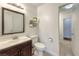 Cozy bathroom with a modern sink and decorative shelves, showcasing a neat space at 6920 Singing Dunes Ln, Las Vegas, NV 89145