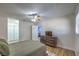View of the room from the bed showcasing the white closet and wooden dresser at 6920 Singing Dunes Ln, Las Vegas, NV 89145