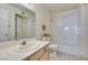 Clean bathroom featuring a vanity with a large mirror and a shower-tub combination at 698 S Racetrack Rd # 711, Henderson, NV 89015