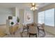 Cozy dining area with modern furnishings, stylish lighting, and a view of the stairway at 698 S Racetrack Rd # 711, Henderson, NV 89015