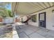 Back patio featuring a covered seating area with basketball game at 715 Heritage Point Dr, Henderson, NV 89002