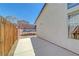 View from the back corner shows a concrete patio and the trampoline in the backyard at 715 Heritage Point Dr, Henderson, NV 89002
