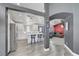Bright, open kitchen with white cabinetry, stainless steel appliances, and a breakfast bar at 715 Heritage Point Dr, Henderson, NV 89002